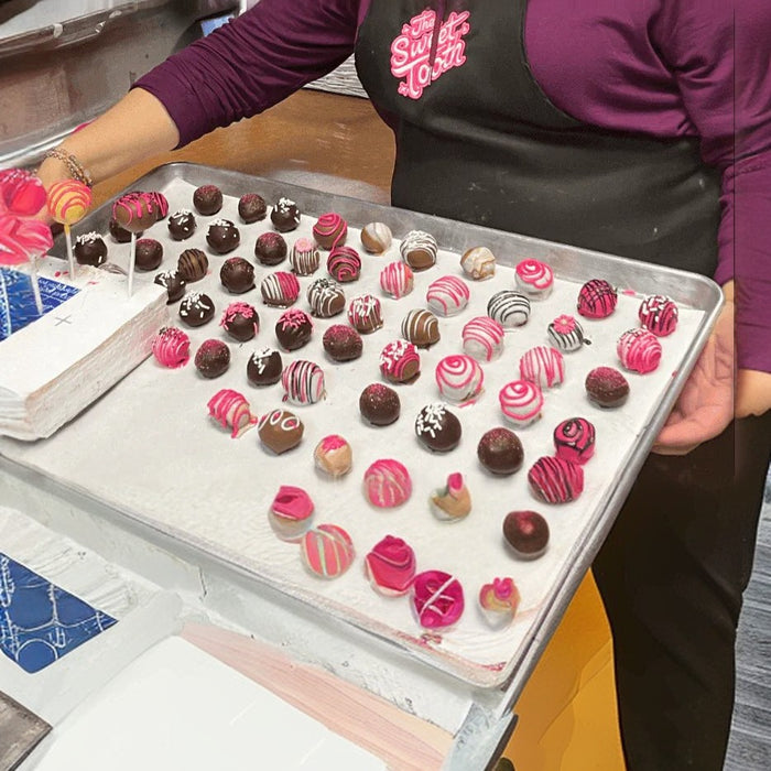 Medium Box of Assorted Truffles and Chocolates featuring colorful, hand-decorated pieces in a premium Truffle Collection gift box. Ideal for thank you gifts. Medium Box of Assorted Truffles and Chocolates featuring colorful, hand-decorated pieces in a premium Truffle Collection gift box. Ideal for thank you gifts.