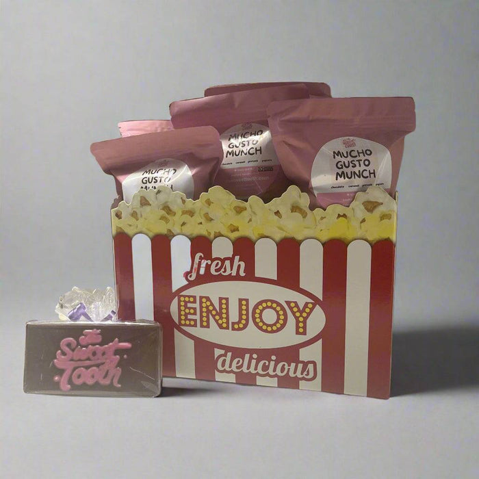 Dad's Snack Attack Box Father's Day Gift featuring Mucho Gusto Munch snacks in a popcorn-themed box with a Sweet Tooth chocolate bar. Perfect food gift basket for Father's Day.