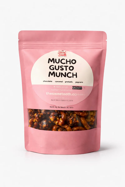 Pink package of 'Mucho Gusto Munch' with visible contents on a white background
