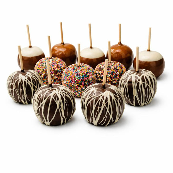 Sukkot chocolate caramel apples with milk, dark and white chocolate drizzle