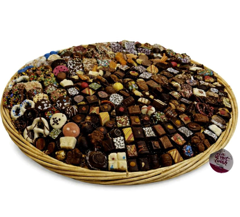 The Sweet Tooth handcrafted corporate chocolate gift basket and shareable pretzel tray corporate gifting display in a North Miami Beach office.
