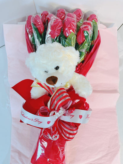 Valentine’s bouquet with red chocolate roses and white teddy bear, included in The Ultimate Valentine’s Day Bundle.