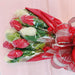 Close-up of chocolate rose bouquet wrapped in red plastic with a Valentine's Day ribbon, ideal for romantic party gifting.