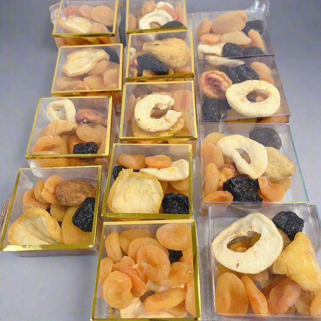 Mini boxes of dried fruits including apricots and apples from SUPREME - Passover, ideal for healthy food gift baskets.