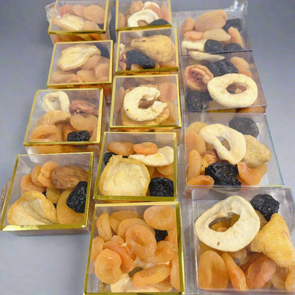 Mini boxes of dried fruits including apricots and apples from SUPREME - Passover, ideal for healthy food gift baskets.