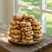 Sweet Tooth Cookies: The Ultimate Gift for Cookie Lovers stacked on a plate, featuring golden-baked chocolate chip cookies in natural light.