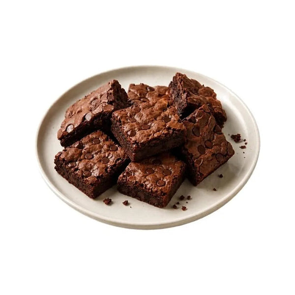 Chocolate chip brownies on a plate from The Sweet Tooth Miami