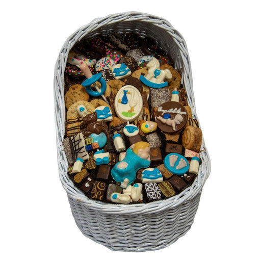Large Baby Boy Bassinet Gift Basket featuring gourmet sweets and blue baby-themed decorations, ideal for baby showers or christenings.