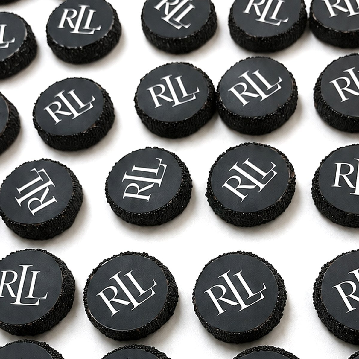 Chocolate dipped Oreos printed with a custom monogram logo